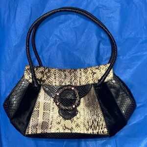 Sharif Studio handbag. Genuine snake skin and leather
